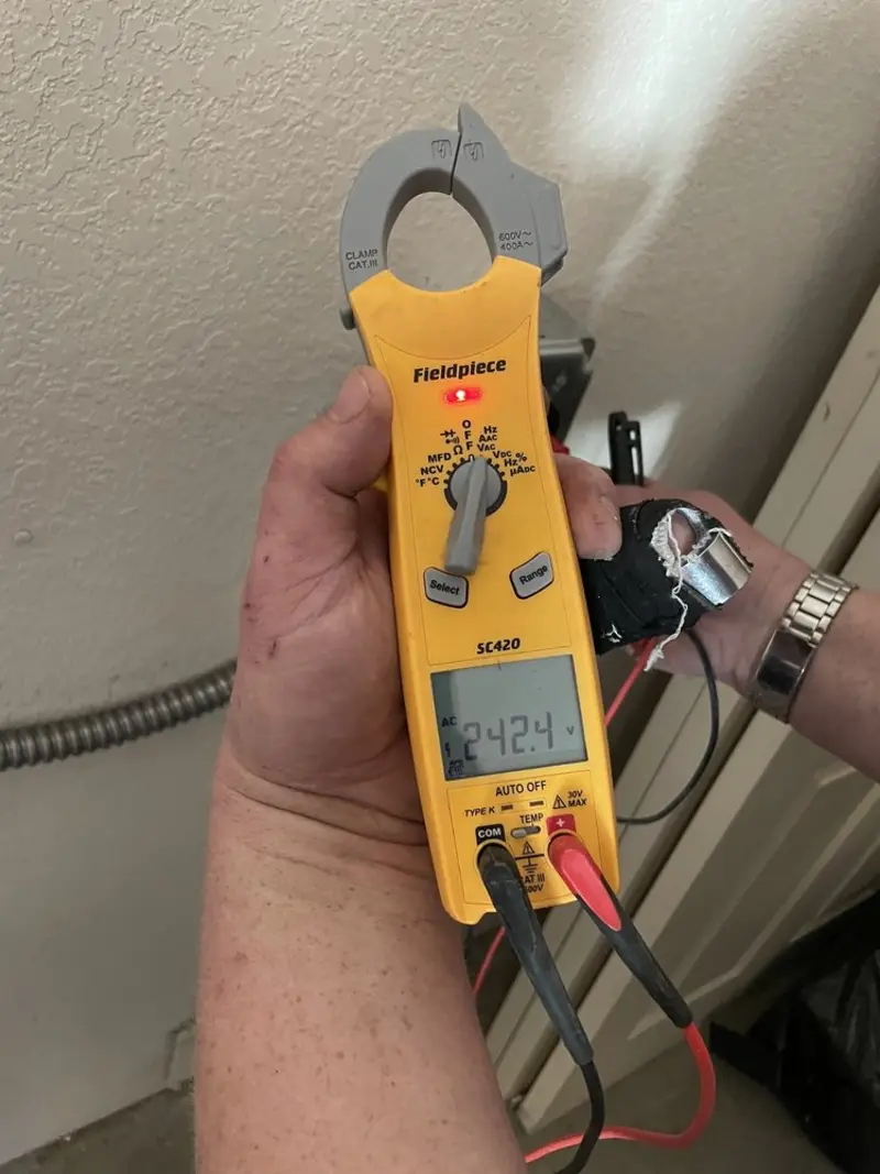 Voltage testing with clamp meter during Outlet Installation in Pennsauken